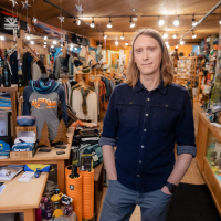 Owner Brendan Madigan shows off Alpenglow's extensive inventory. Photo Credit: Alpenglow Sports