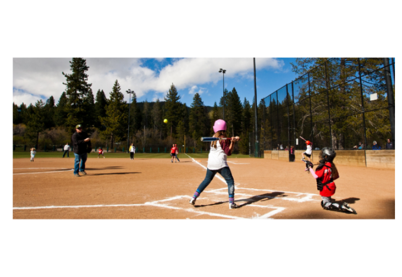 Girl playing softball